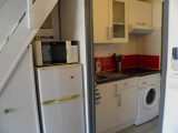 Coin cuisine avec lave-linge
