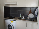 Coin kitchenette avec lave-linge